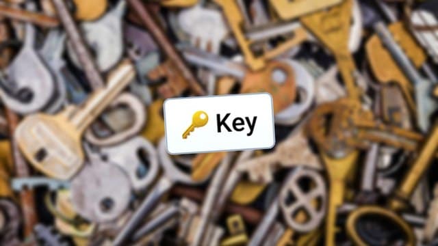 Infinite Craft Key block atop a blurred backdrop featuring bronze, gold, and silver-colored keys