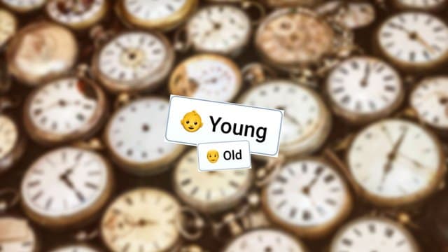 Infinite Craft Young and Old block atop a blurred backdrop featuring various clocks and stopwatches