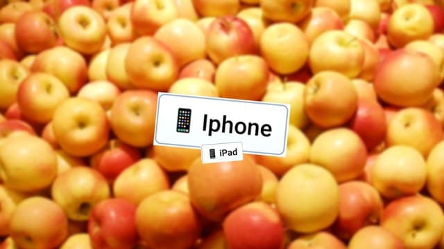 Infinite Craft iPhone and iPad block atop a blurred background featuring various red and yellow apples